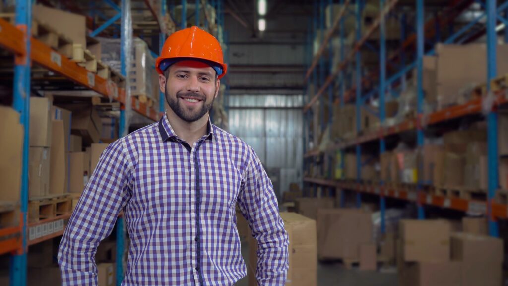 What does a production manager do? Image of production manager in warehouse.